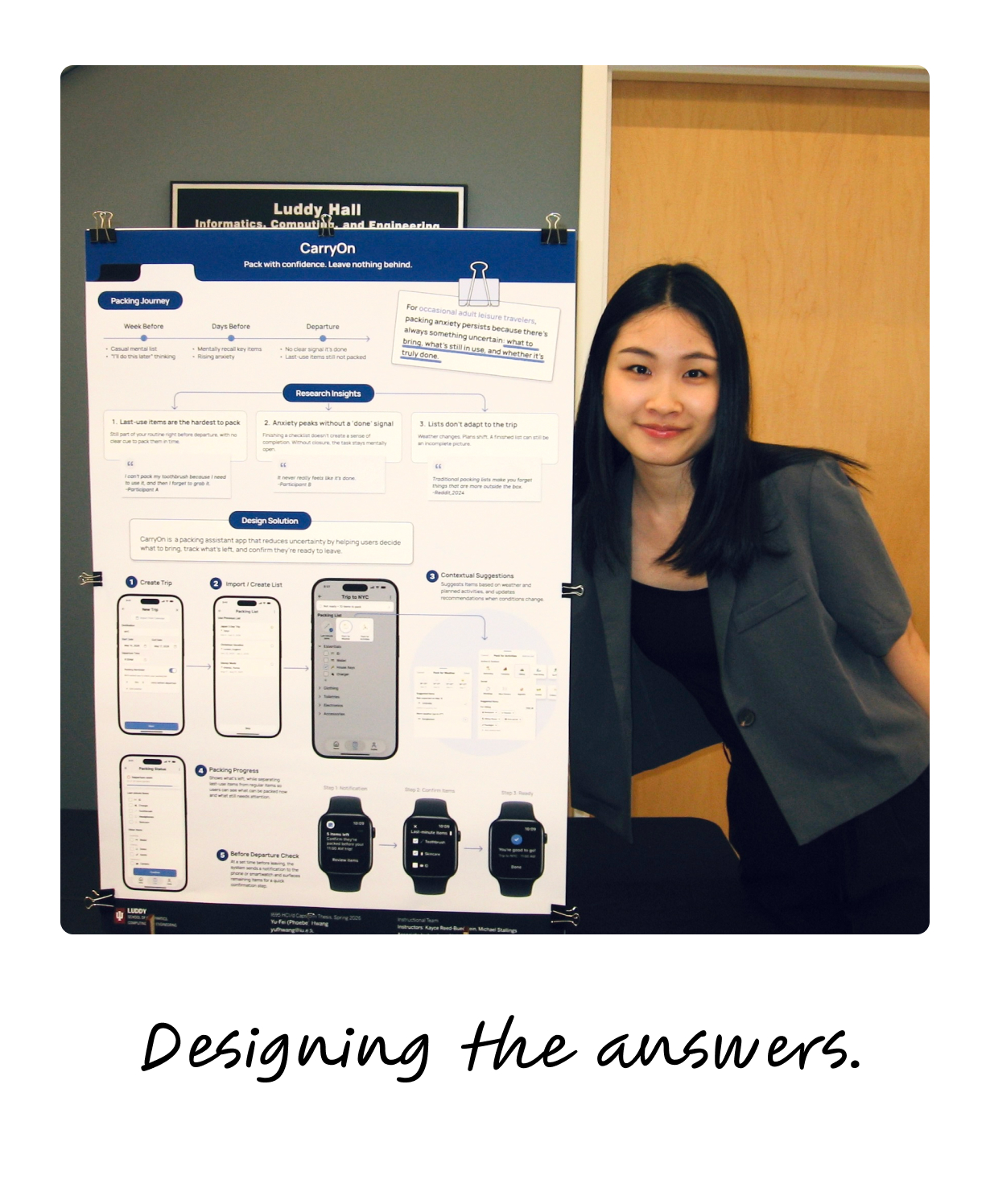 Standing beside the CarryOn capstone poster — designing the answers.