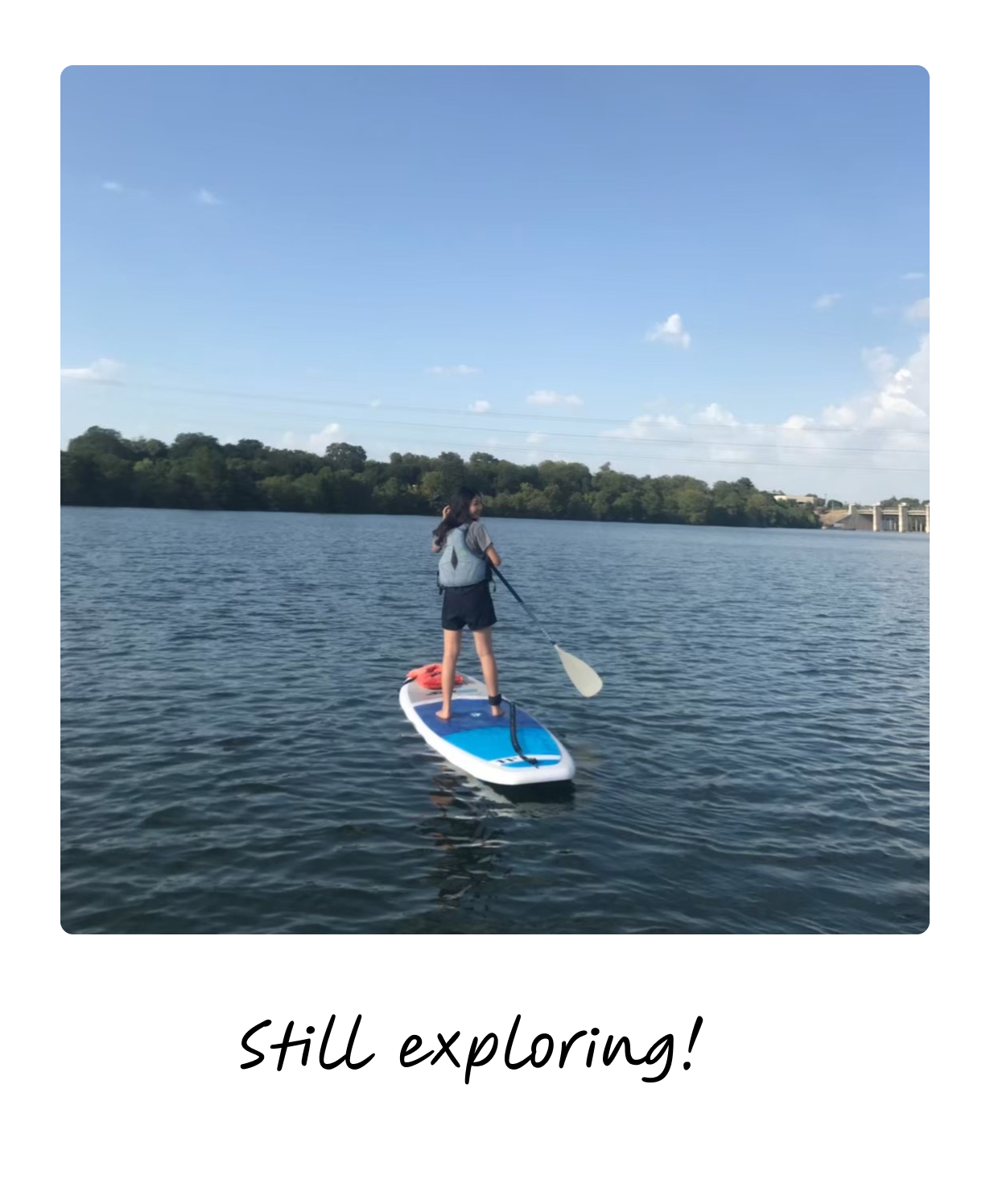 Paddleboarding on a calm lake — still exploring.